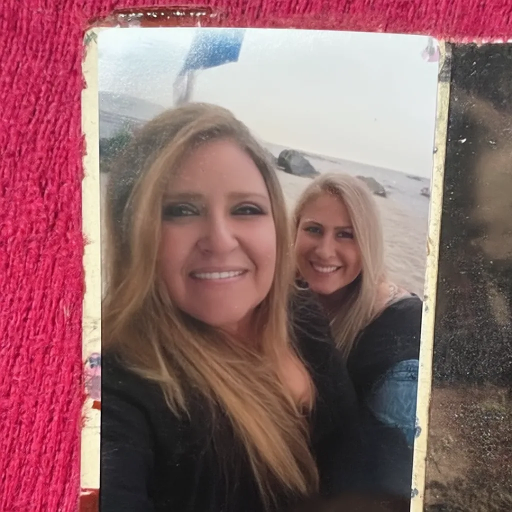 Generated image of two women at a beach instead of a dog